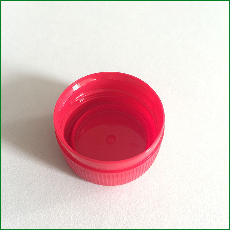 Aspects associated with a plastic cap mold